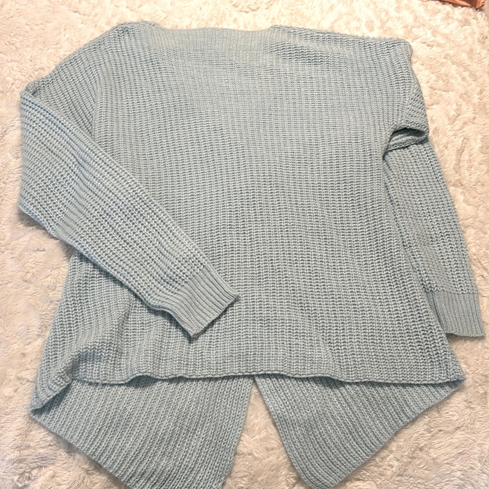 Baby blue sweater with rhinestone embellishment